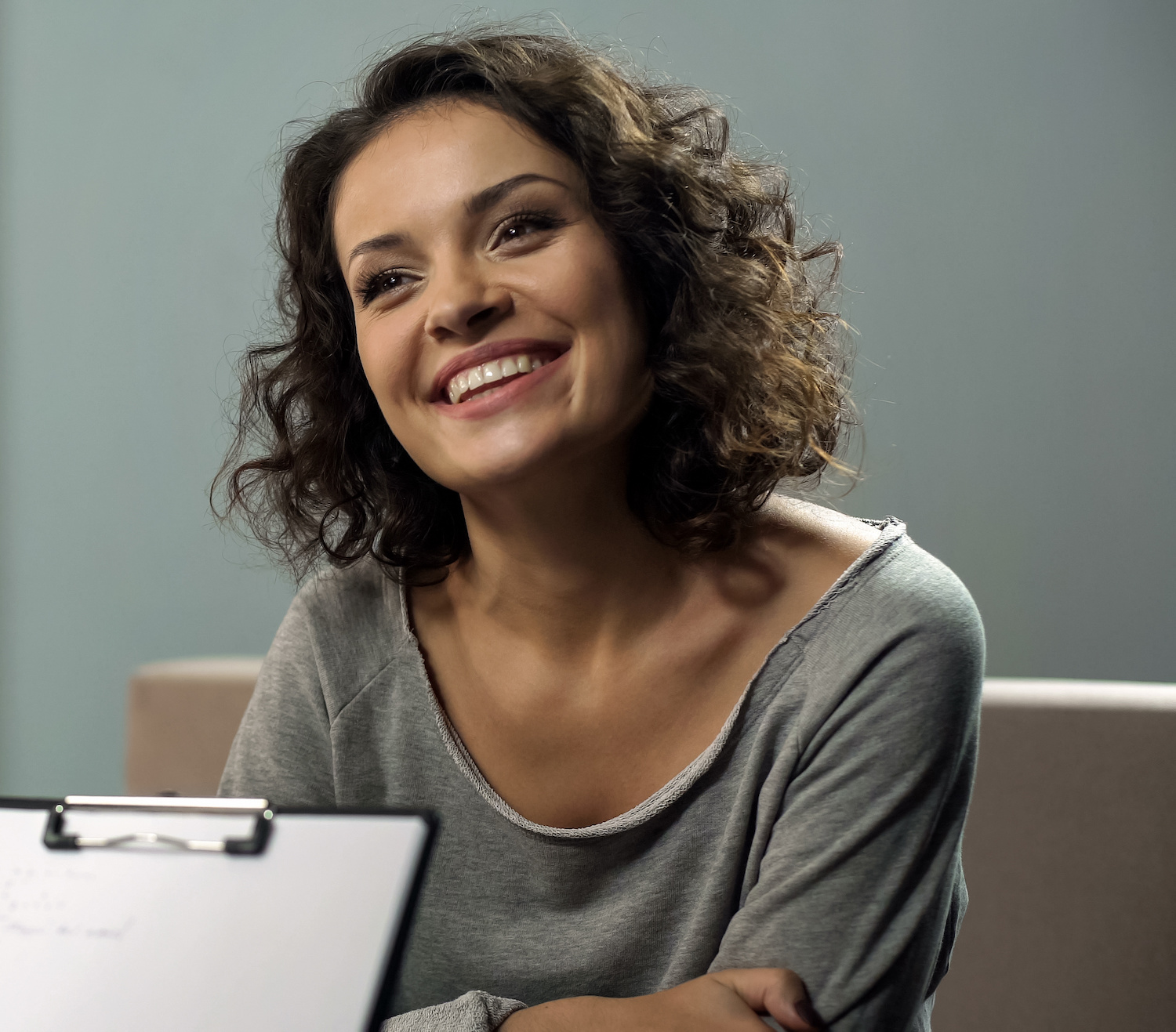Smiling woman feeling confident during therapy